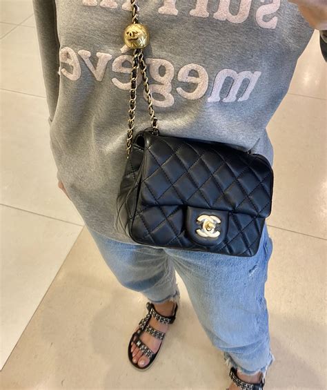 chanel black flower bag|Chanel black mini flap bag.